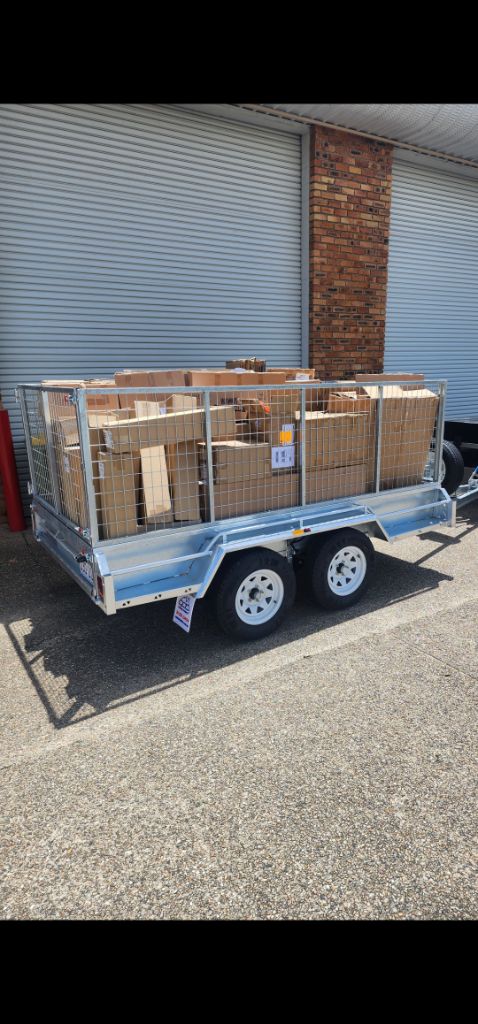 EZI trailer fully loaded with rubbish and boxes